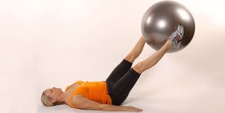 Holding the exercise ball between the raised legs develops the lower press